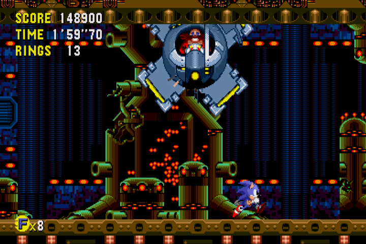 Captura de pantalla que muestra la  batalla contra el Dr. Eggman en Metallic Madness.
